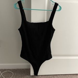 Black square neck body suit. Never worn!!!!
